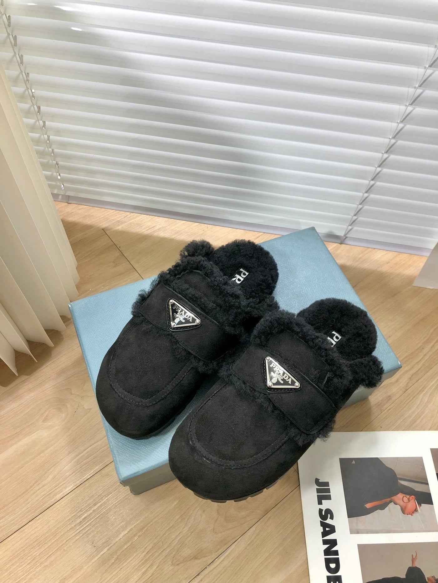 Prada Shearling Slippers