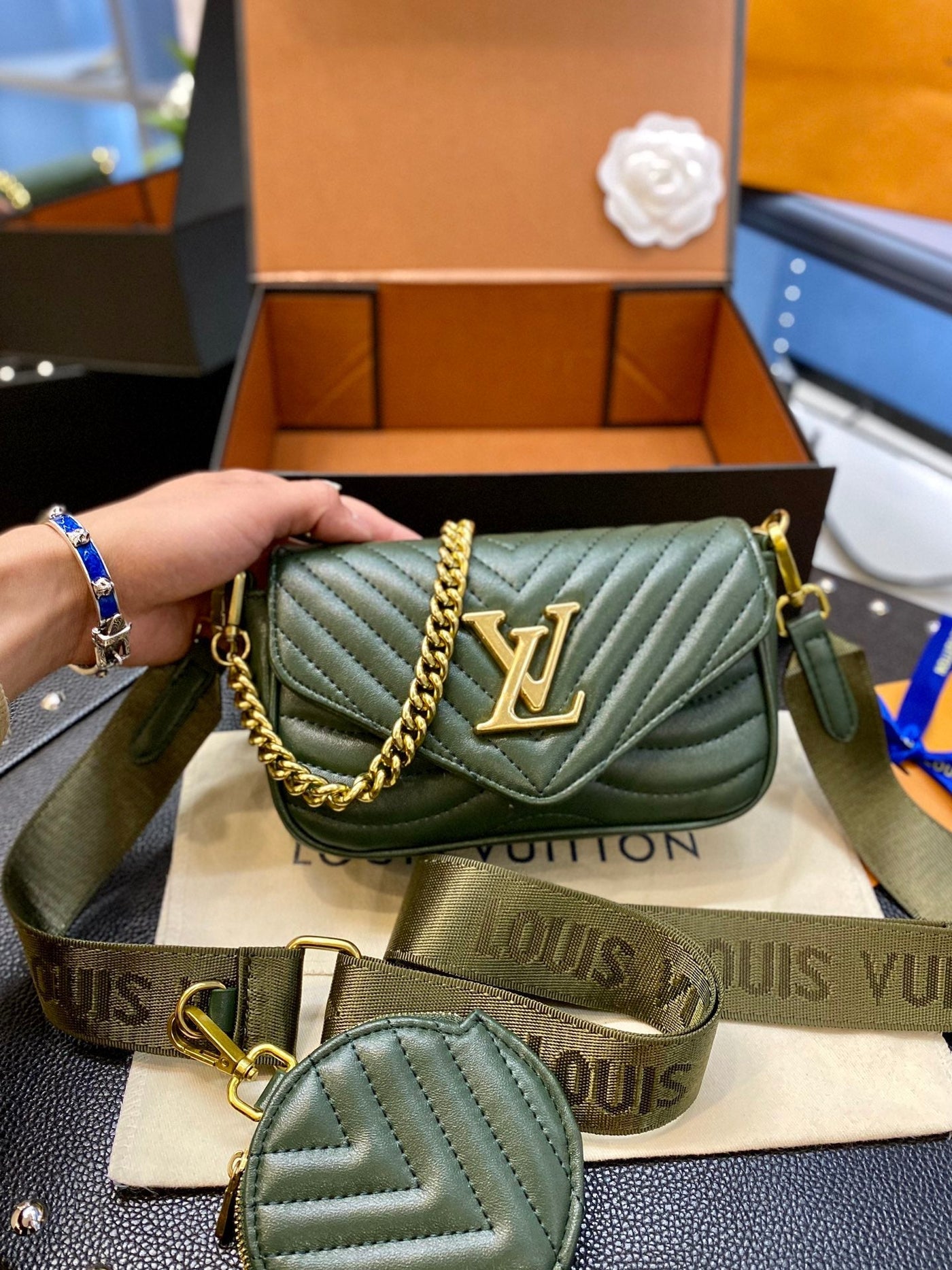 Budget Louis Vuitton New Wave Bag