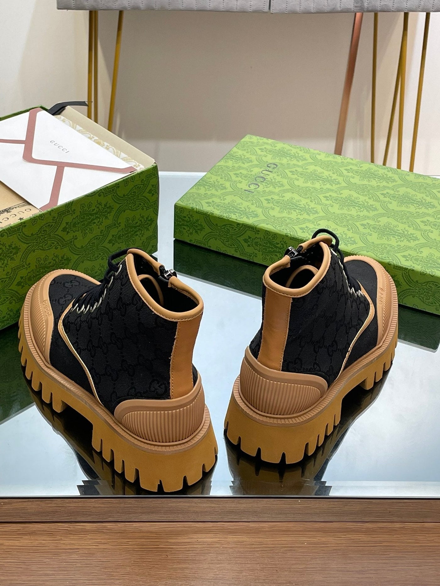 Gucci  GG Canvas Boots