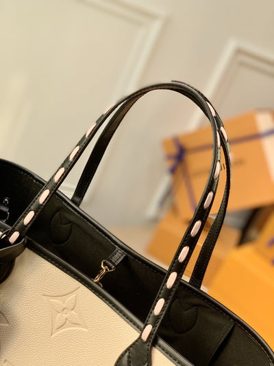 Louis Vuitton "Wild At Heart'' Neverfull MM Bag