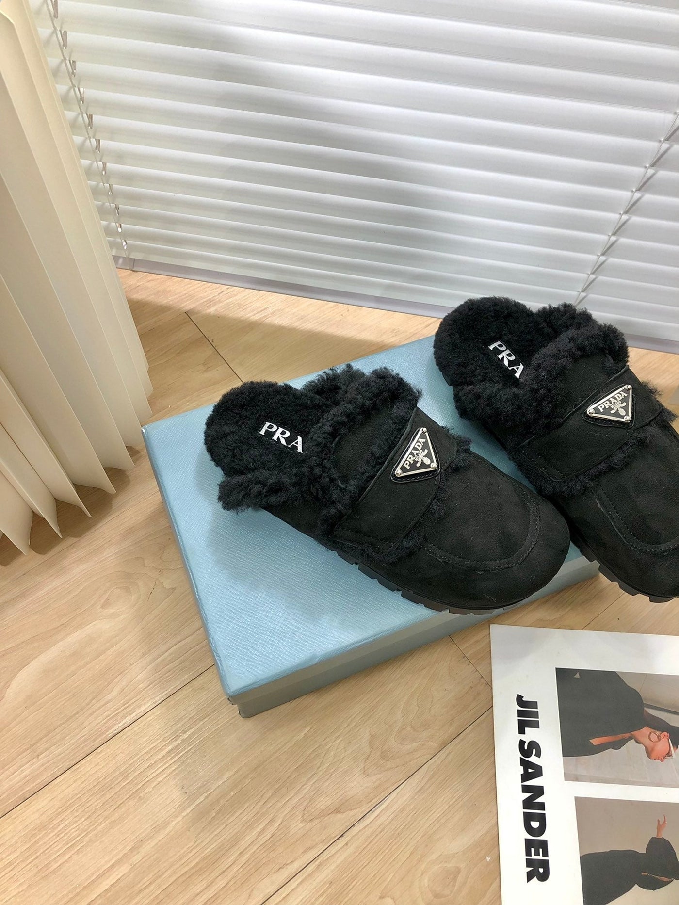 Prada Shearling Slippers