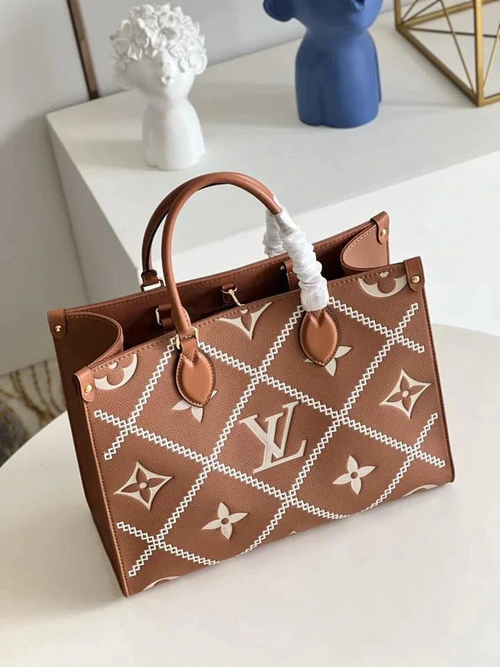 Louis Vuitton On The Go MM Tote Bag